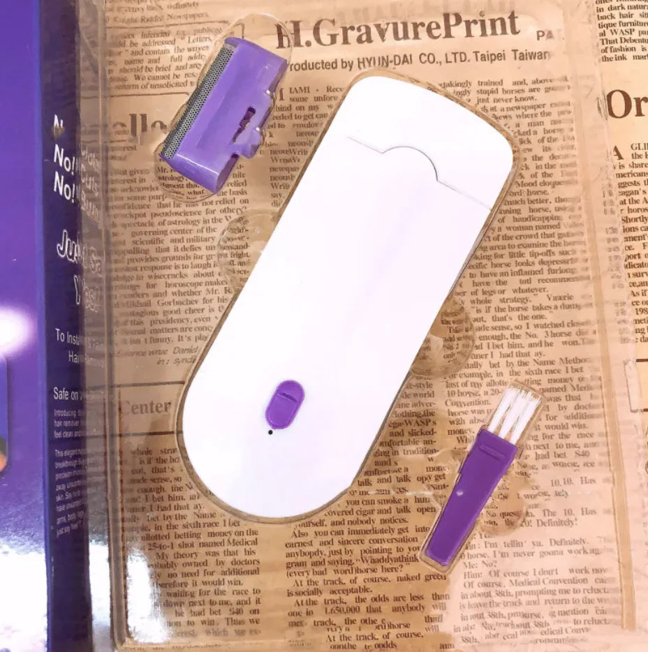 White electronic device with purple components on newspaper background
