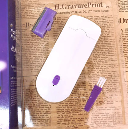 White electronic device with purple components on newspaper background