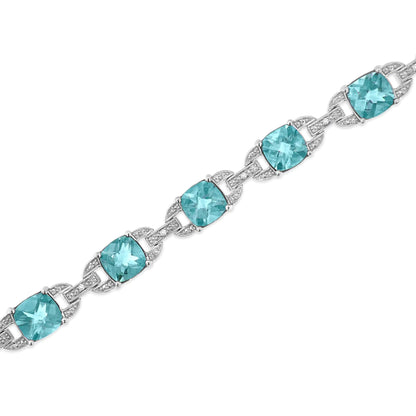 .925 Sterling Silver 7x7 mm Cushion Cut Blue Topaz and 1/20 cttw Round Cut Diamond Fashion Tennis Bracelet (I-J Color, I1-I2 Clarity) - 7" WEM Support (www.WEM.support)