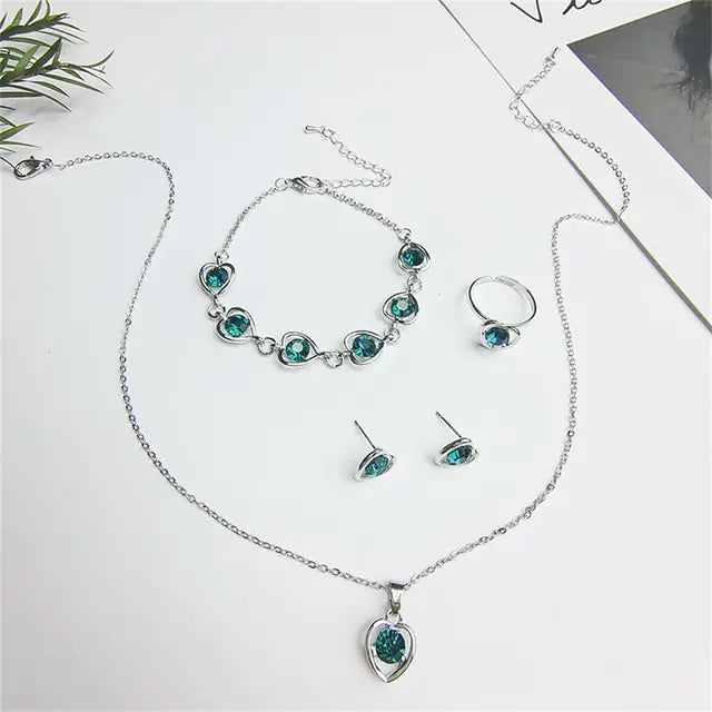 Luxury Cutout Heart Colored Zircon Stud Earring Bracelet Necklace WEM Support (www.WEM.support)