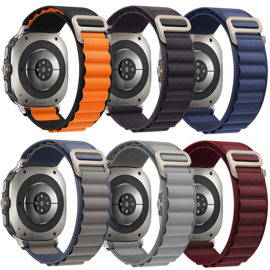 A collection of six nylon watch bands in various colors, designed to be compatible with Apple Watches.
