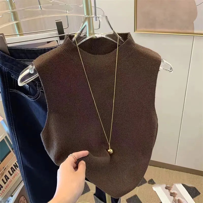 Women's small camisole vest with sweater underneath WEM Support (www.WEM.support)