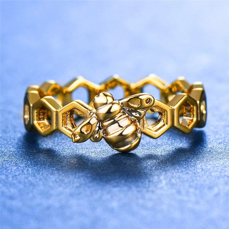 Gold and Rose Gold Colored Honeycomb Ring with Bee Accent WEM Support (www.WEM.support)