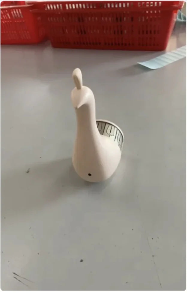 A white peacock-shaped 3D wall lamp with red arrows indicating the light source