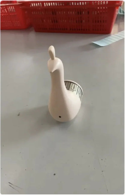 A white peacock-shaped 3D wall lamp with red arrows indicating the light source