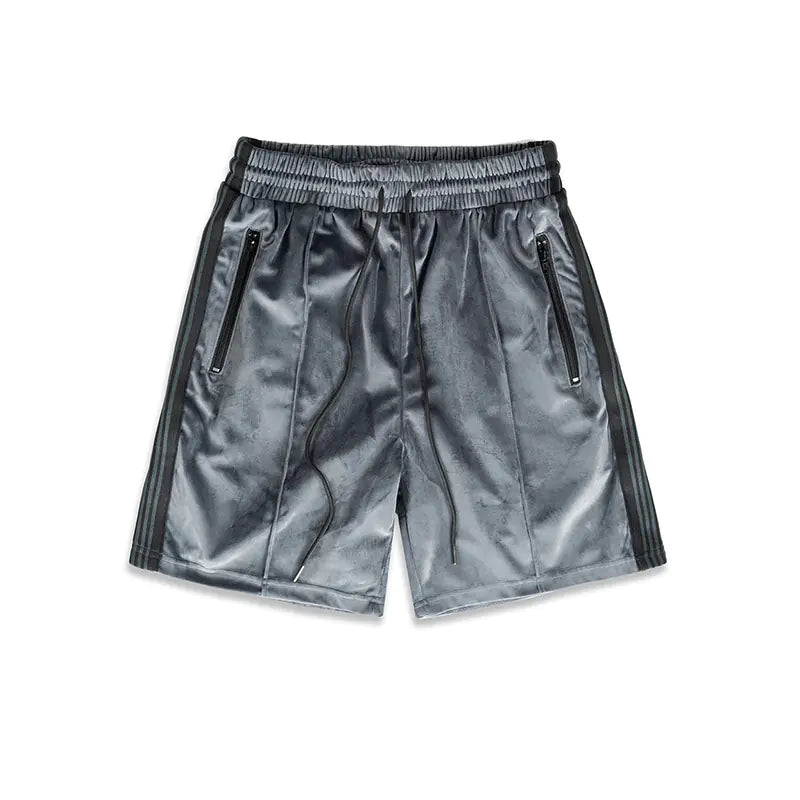 A pair of gray suede sports webbing shorts with a mid-waist design, side pockets, and a drawstring waistband.
