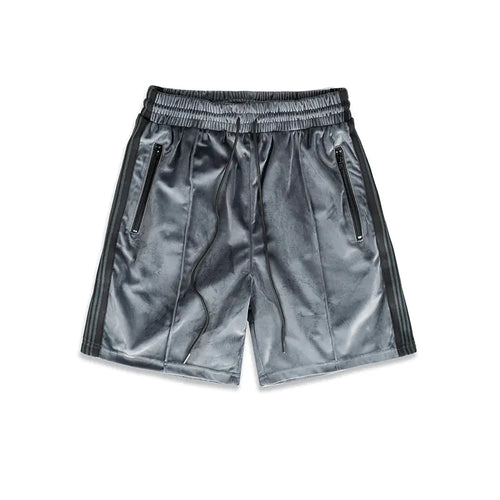 A pair of gray suede sports webbing shorts with a mid-waist design, side pockets, and a drawstring waistband.