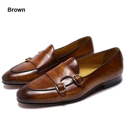 A pair of brown cowhide leather double buckle shoes on a white background.