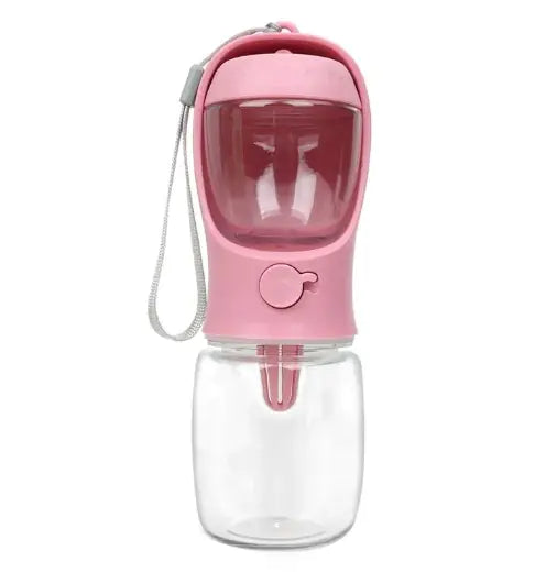 A portable dual-use dog drinking cup in pink color, with a water reservoir on top and a detachable compartment at the bottom for storing snacks.