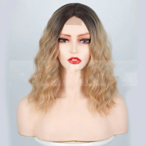 A mannequin head displaying a lace front wig with wavy gold-colored hair.