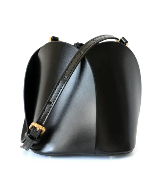 A black leather flower bucket bag with a structured shape and a shoulder strap.