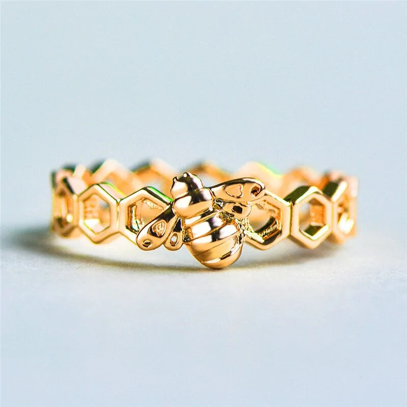 Gold and Rose Gold Colored Honeycomb Ring with Bee Accent WEM Support (www.WEM.support)