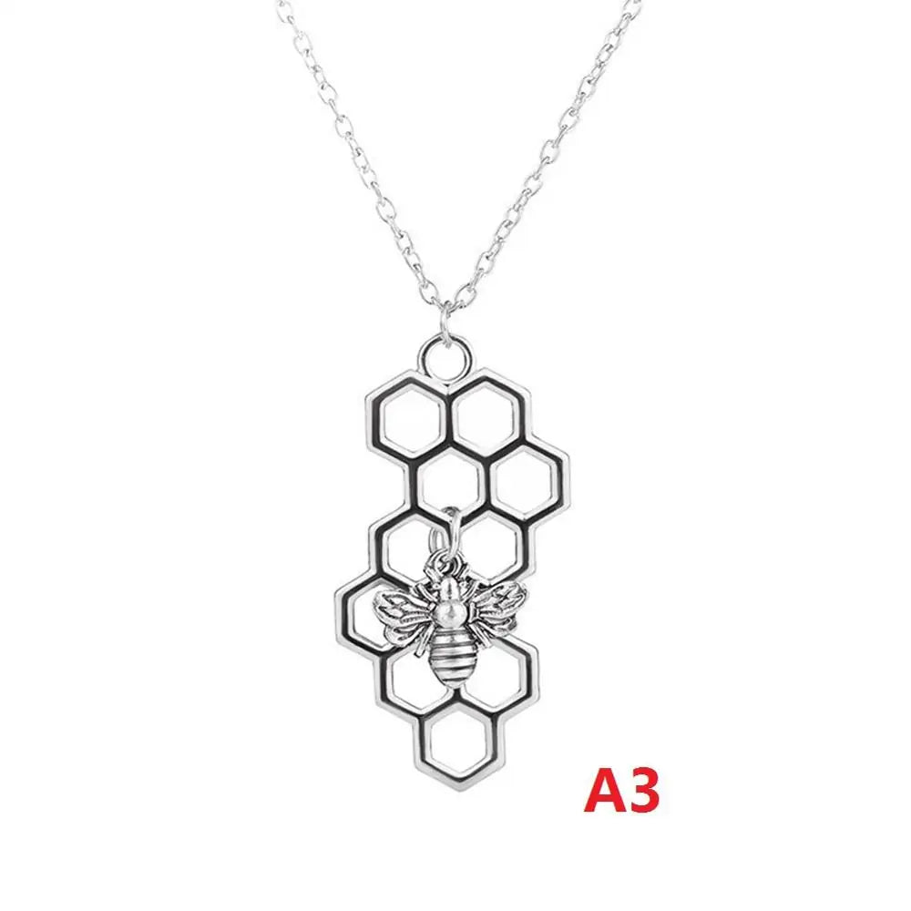 Vertical Honeycomb Pendant With Bee And Chain WEM Support (www.WEM.support)