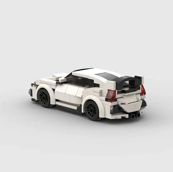 A white Honda Civic Type R model car constructed from LEGO bricks, viewed from a rear three-quarter angle.