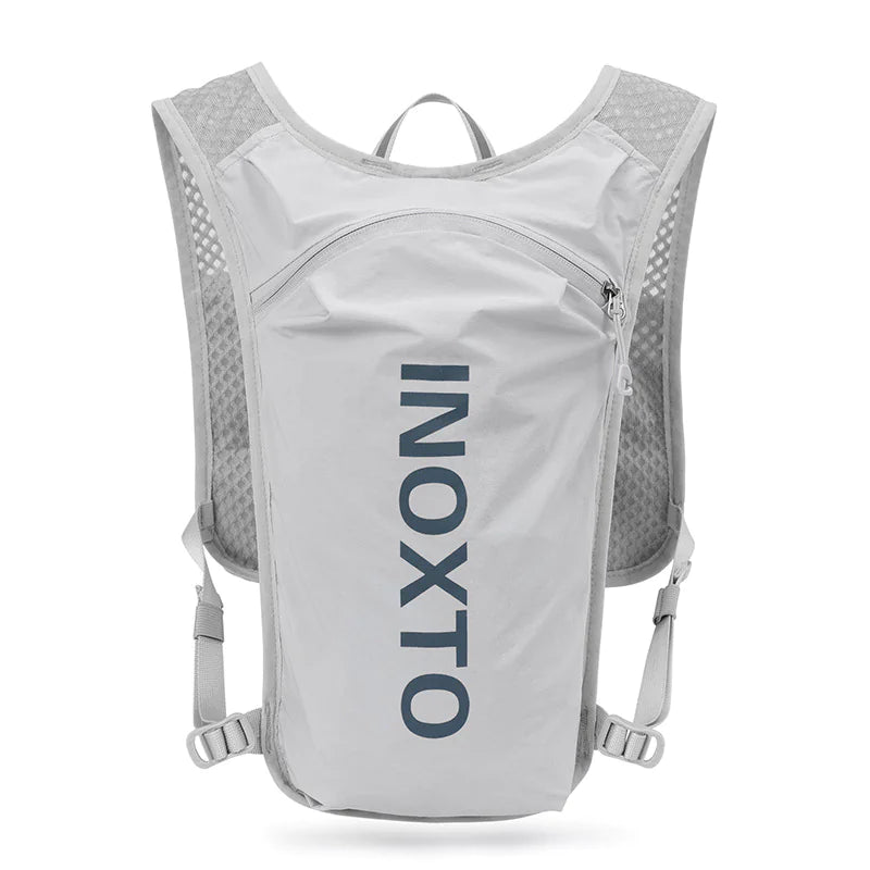 A black hydration backpack with blue text on the front, designed for running or outdoor activities.