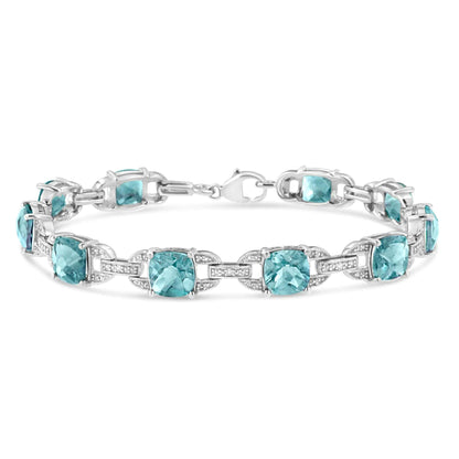 .925 Sterling Silver 7x7 mm Cushion Cut Blue Topaz and 1/20 cttw Round Cut Diamond Fashion Tennis Bracelet (I-J Color, I1-I2 Clarity) - 7" WEM Support (www.WEM.support)