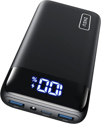 A white INIU portable charger with LED display showing charge percentage, featuring two USB ports.