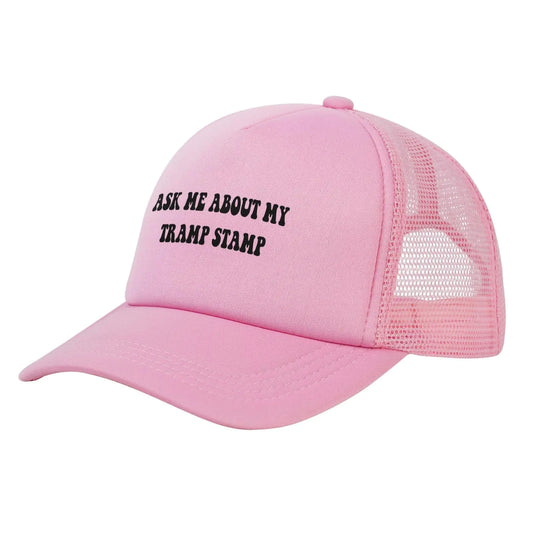 A pink trucker hat with the text 'ASK ME ABOUT MY TRAMP STAMP' printed on the front.