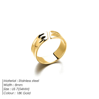A gold-colored ring with an irregular concave-convex pattern and smooth opening, displayed against a white background.