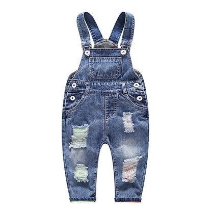 A pair of kid's simple denim suspender pants with a button closure and adjustable straps.