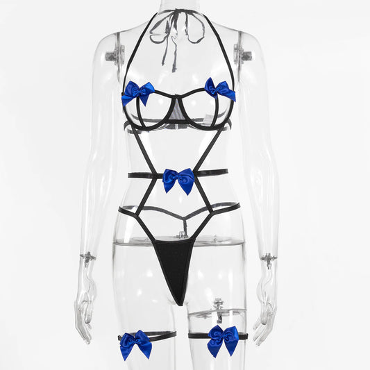 A mannequin wearing a black lace halter neck suit with blue bowknot details.