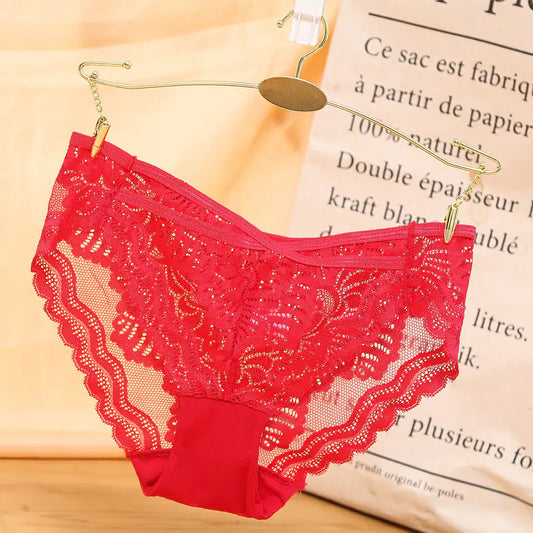 This image features a pair of low waist, sexy lace women's panties in a vibrant red color. The panties are designed with an intricate lace pattern that adds a touch of elegance and sophistication.