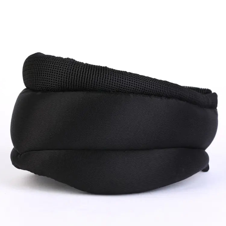 A black magnetic neck support strap designed for cervical correction, showing the curved padding for the neck.