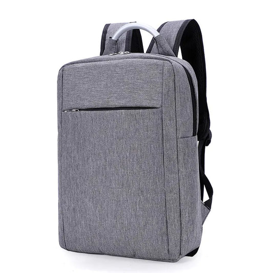 A gray nylon laptop backpack with a front zipper pocket and adjustable shoulder straps.