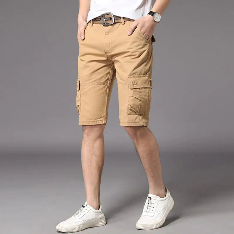 A pair of men's casual black shorts, showing a straight fit and mid-waist rise. The image depicts the shorts worn with a white t-shirt and white sneakers, highlighting the casual and outdoor-friendly style.