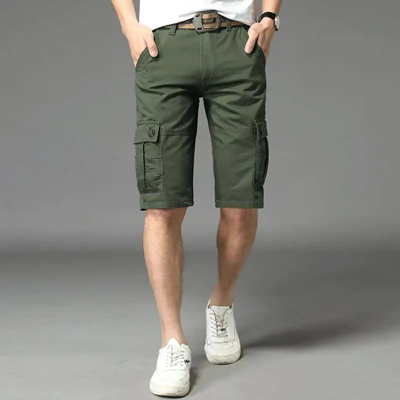 A pair of men's casual black shorts, showing a straight fit and mid-waist rise. The image depicts the shorts worn with a white t-shirt and white sneakers, highlighting the casual and outdoor-friendly style.