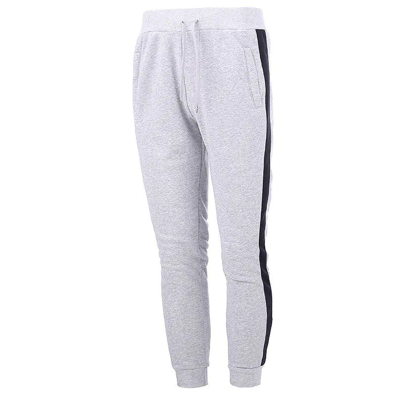 A pair of men's casual sports pants with stitching details on the side, made from polar fleece fabric.