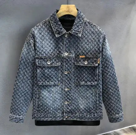 Men's denim vintage jacket displayed on a mannequin, showing the back view with collar, side pockets, and a branded patch on the lower back.