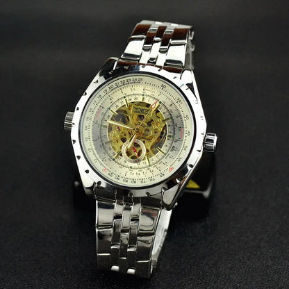 A men's hollow automatic mechanical watch with a silver steel band and a silver dial, showcasing a hollow-out design.