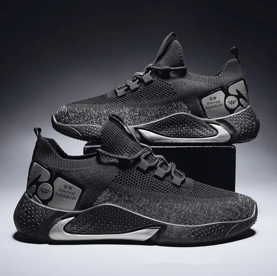 A pair of men's casual sports shoes with a breathable flying knit upper in black color, featuring a round toe shape, low heel, and a front tie wearing style.