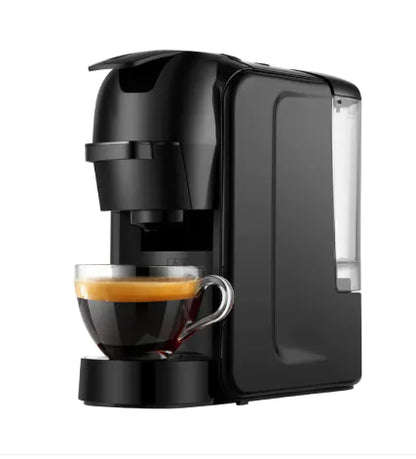 A black Italian capsule coffee machine with a cup of coffee placed on its base.