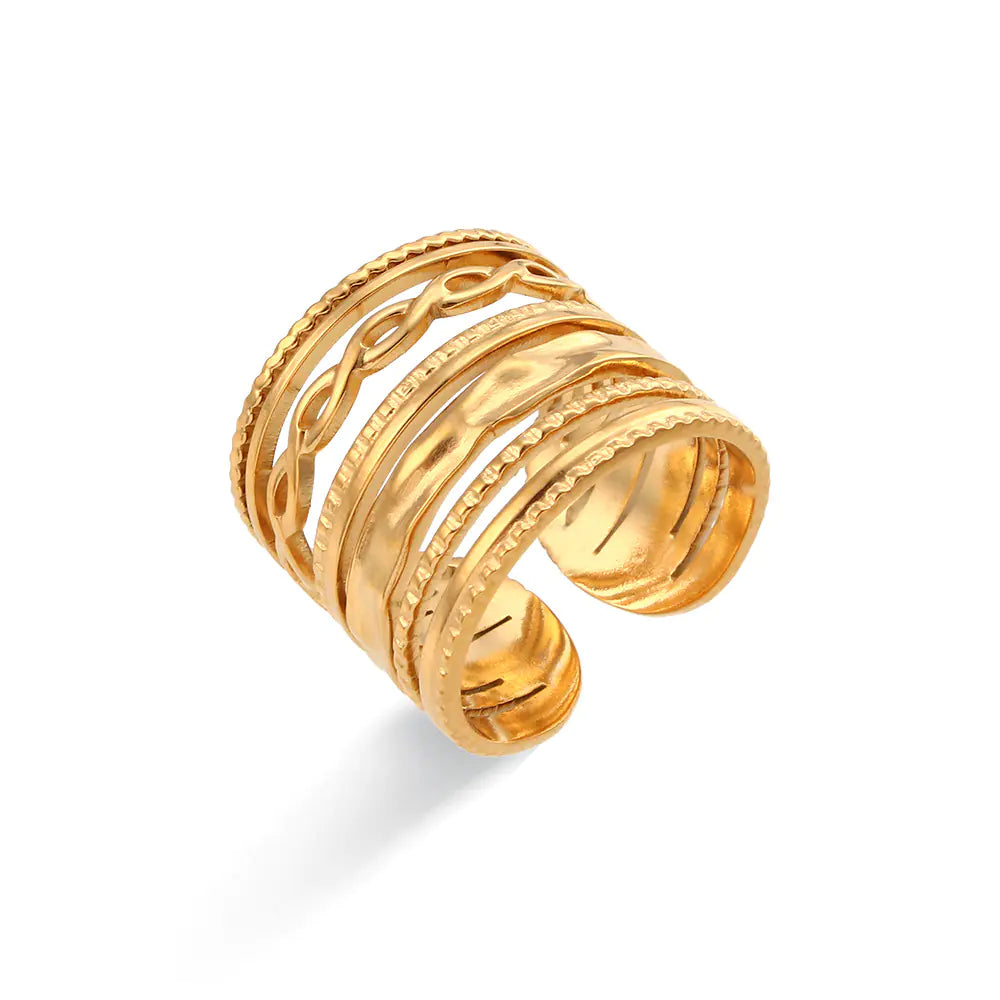 A gold-colored stainless steel woven ring with an adjustable band.