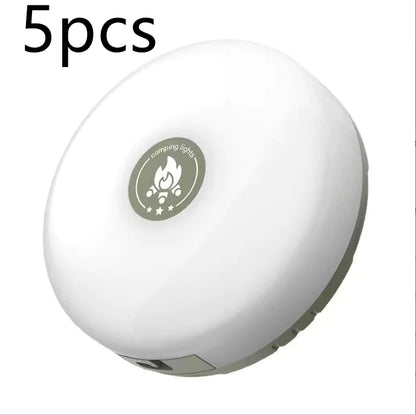 A white outdoor string camping lamp with a green logo in the center.