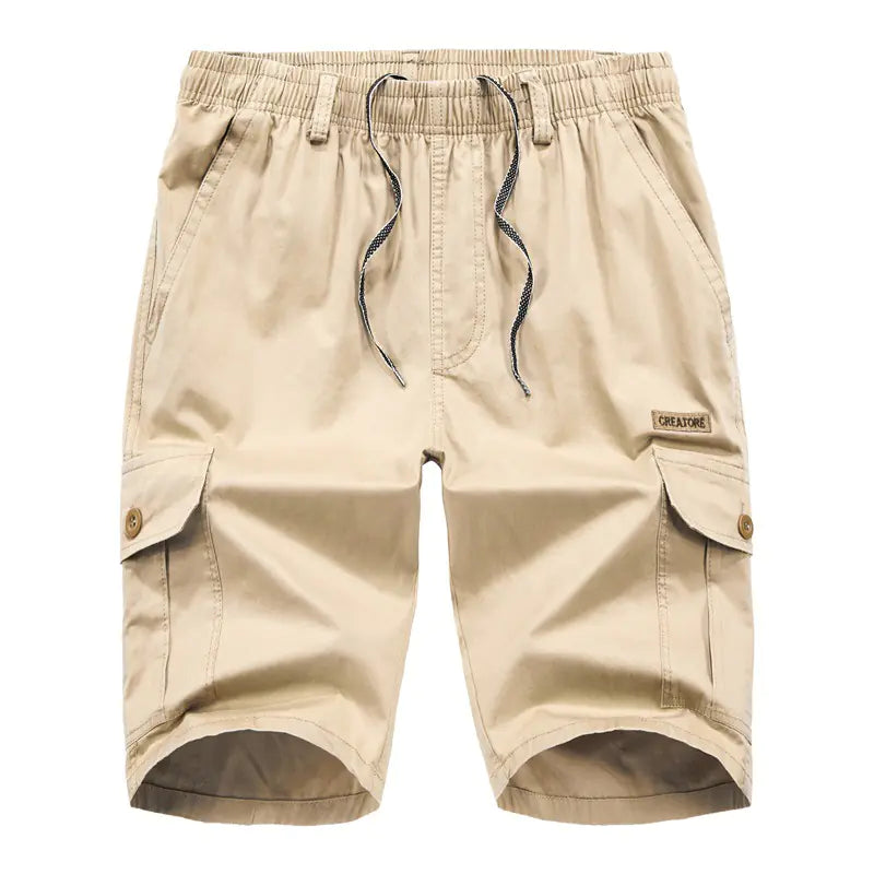 A pair of army green casual plus size multi-pocket elastic shorts with a drawstring waist.