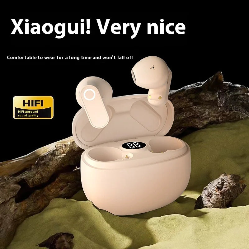 A pair of beige ear hook Bluetooth headphones displayed in an open charging case, with a descriptive text 'Xiaogui! Very nice' and additional product attributes mentioned.