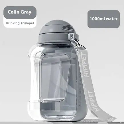 A portable pet water bottle in Colin Gray color with a capacity of 1000ml, featuring a drinking trumpet and a detachable food container.