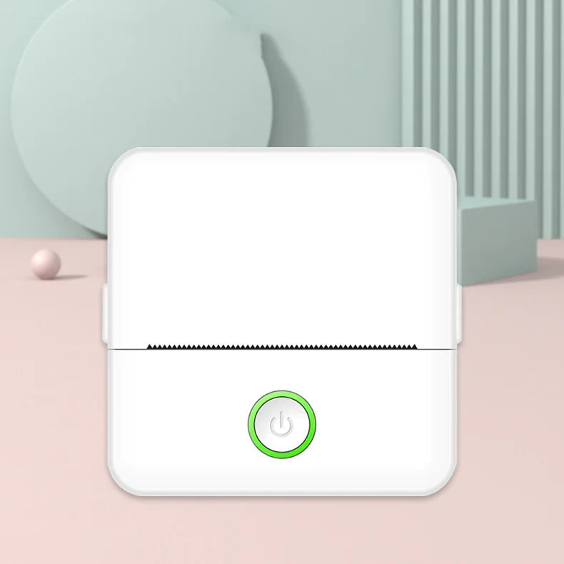 A compact white portable thermal printer with a green power button, displayed on a dual-tone background with abstract shapes.