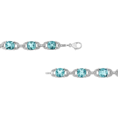 .925 Sterling Silver 7x7 mm Cushion Cut Blue Topaz and 1/20 cttw Round Cut Diamond Fashion Tennis Bracelet (I-J Color, I1-I2 Clarity) - 7" WEM Support (www.WEM.support)