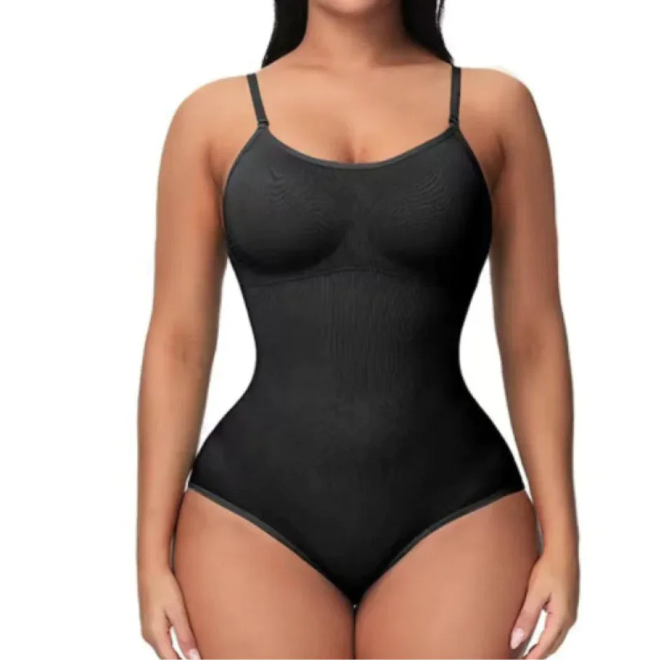 A woman wearing a black seamless corset with adjustable straps.