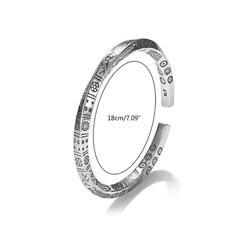 A vintage style bracelet with a totem design, featuring intricate patterns and a twisted rope style, measured at 18cm/7.09 inches in circumference.