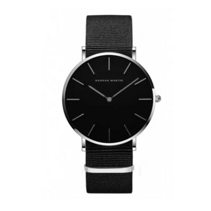 A black and rose gold waterproof leather watch with a striped pink and blue strap, and a sleek design.