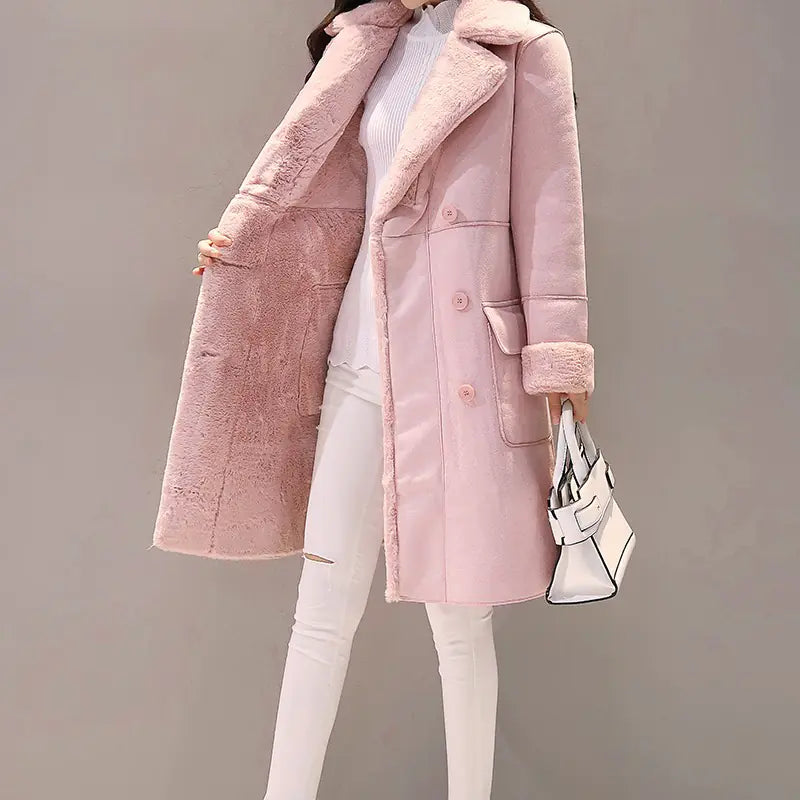 Two women modeling long lambswool coats in light gray and light pink colors, featuring a lapel collar and long sleeves.