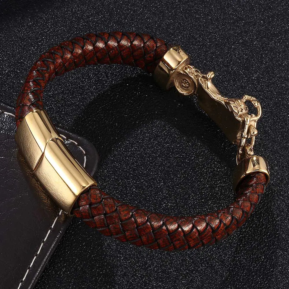 A woven leather motorcycle bracelet with gold stainless steel accents, displayed on a dark background.