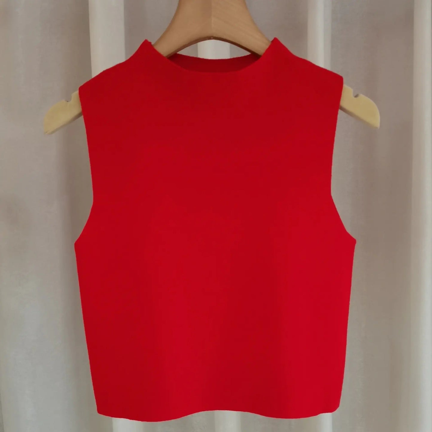 Women's small camisole vest with sweater underneath WEM Support (www.WEM.support)