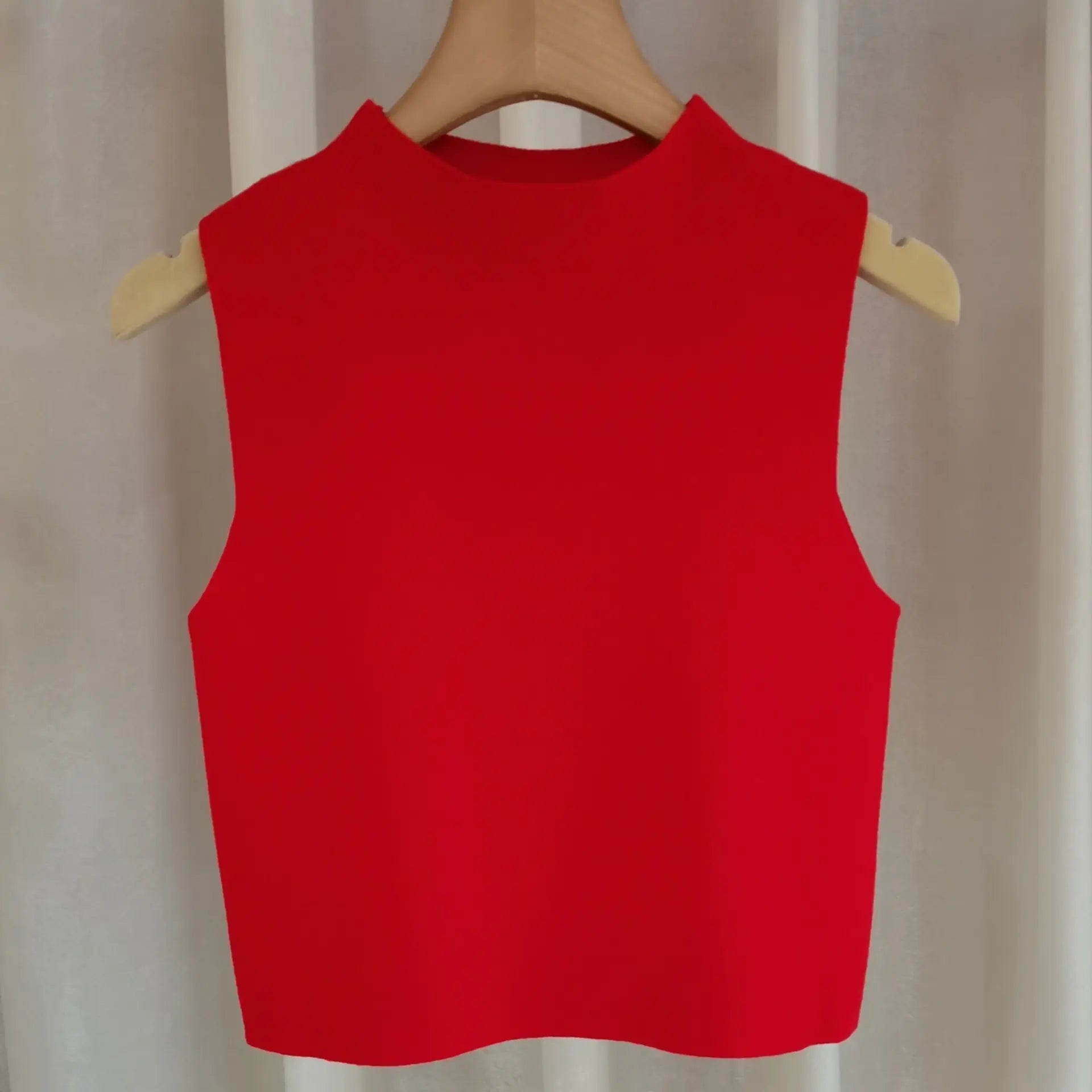 Women's small camisole vest with sweater underneath WEM Support (www.WEM.support)