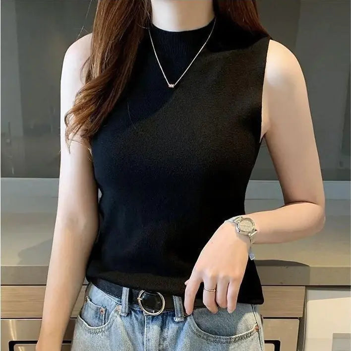 Women's small camisole vest with sweater underneath WEM Support (www.WEM.support)